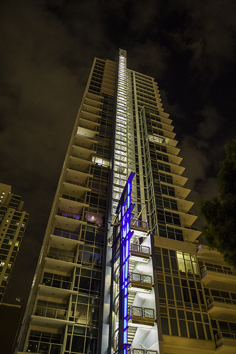 a building with a well lit staircase