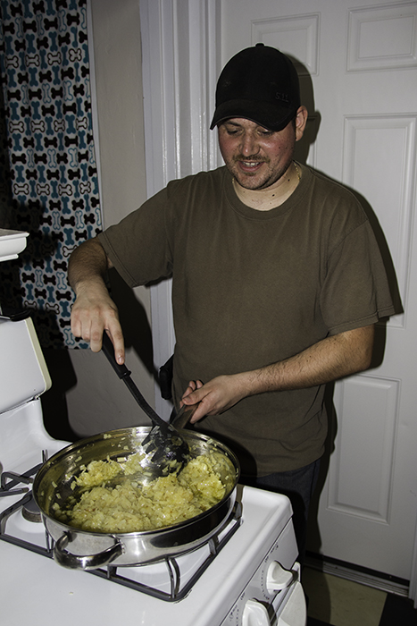 Mike stirring the onions