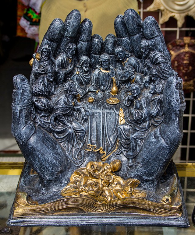 Jesus eating out of the palm of his hands