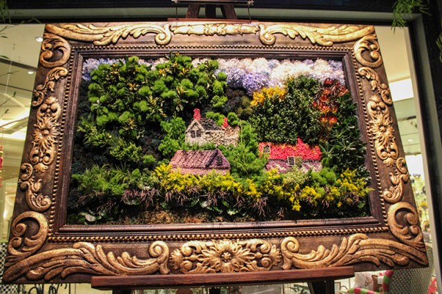 floral arrangement inspired by Thayer's My Childhood Trees - 1,200 flowers in a six-foot tall frame