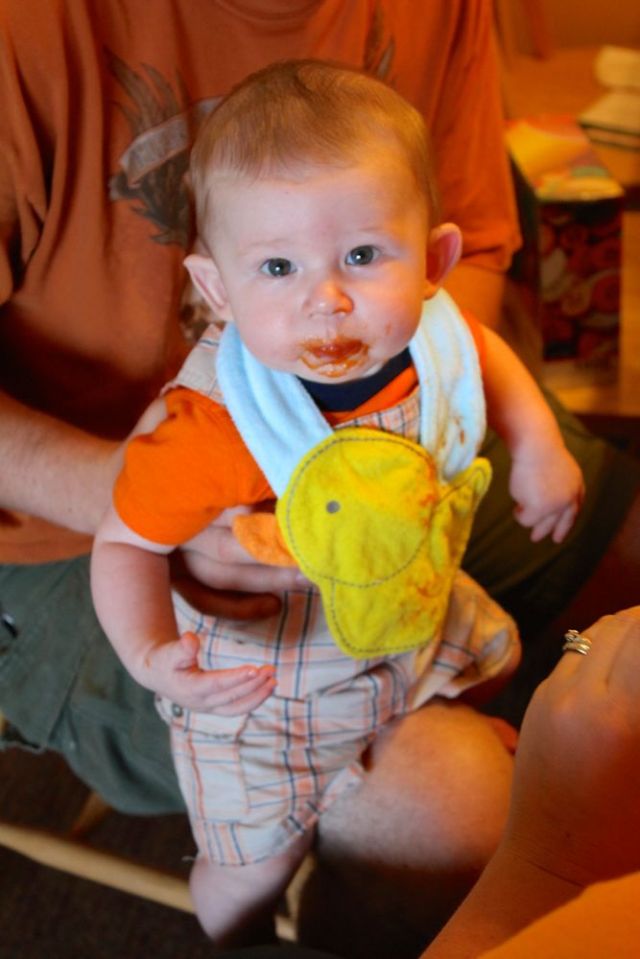 Tristan eating orange and Kris and Vicki wearing orange too