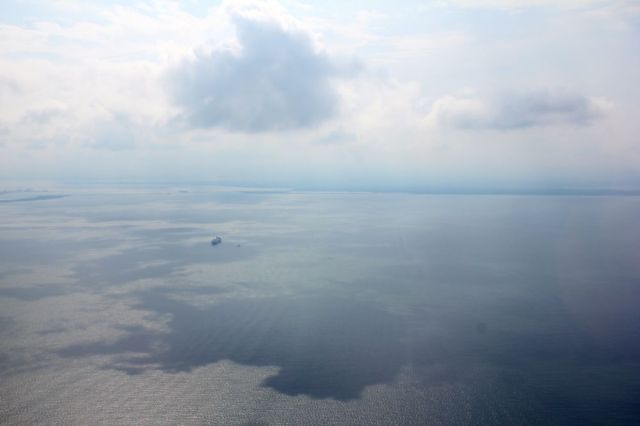 circling over the ocean for landing in Norfolk