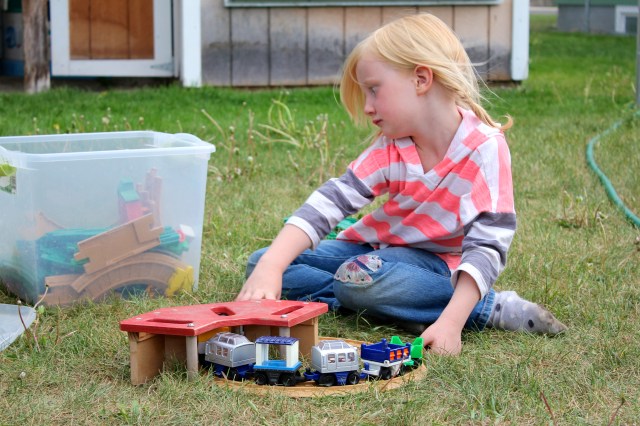 Sammi playing with trains
