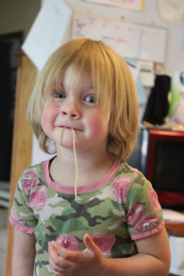 a T-rex eating a worm