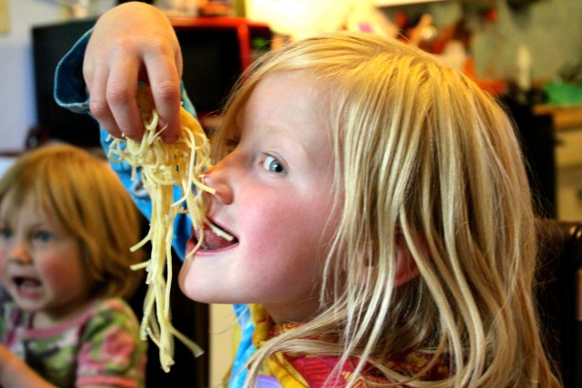 a T-rex with a long arm