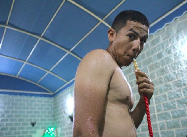 Aaron on the hookah out of the pool