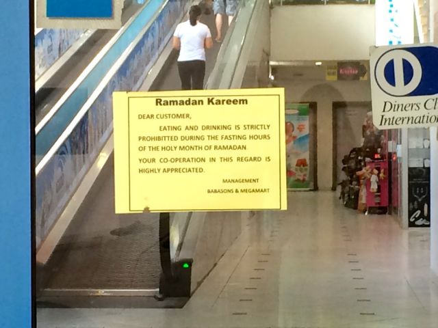 sign on Mega Mart door