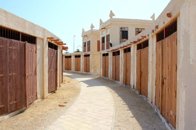 another row of stables, barracks, storage, and shops