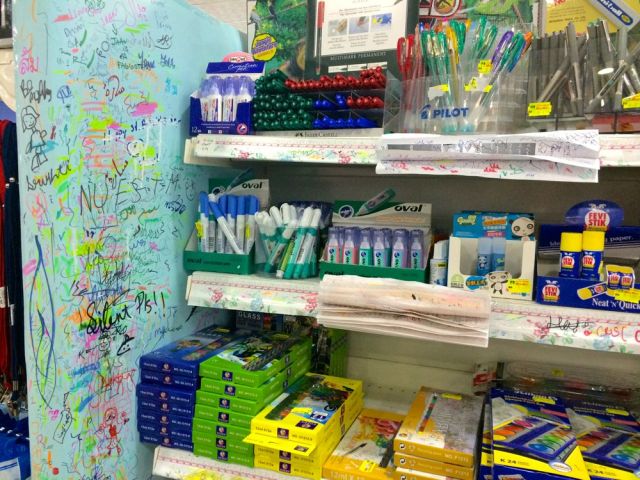 school supplies with sampling wall