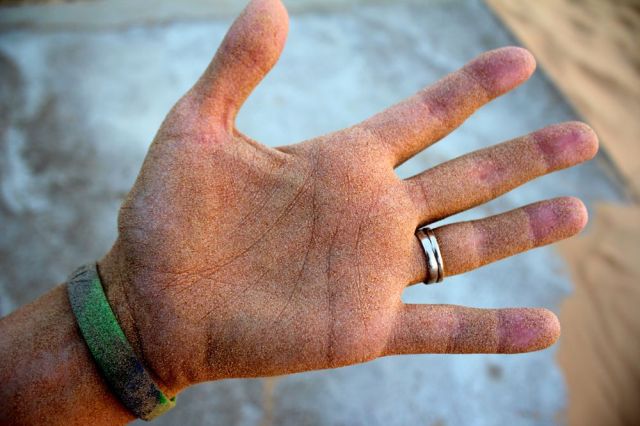 one of the many signs you're in the desert: you're covered in it