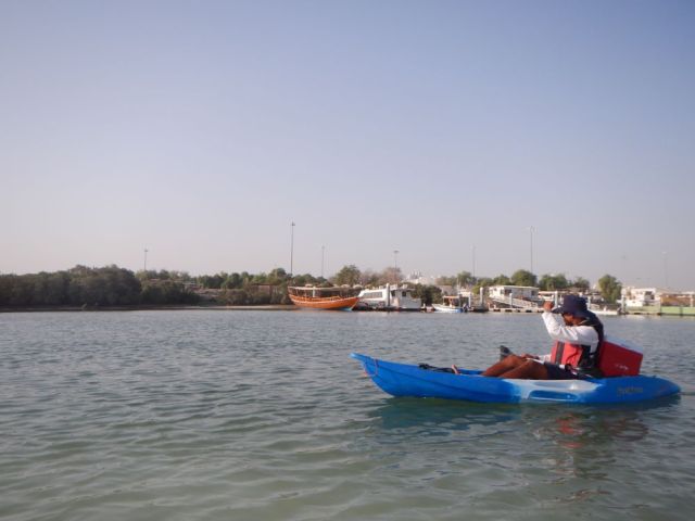 our tour guide looking into the sun