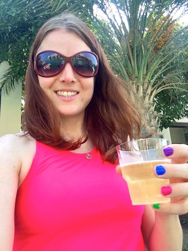 sipping bubbly in the shade with friends by the canal