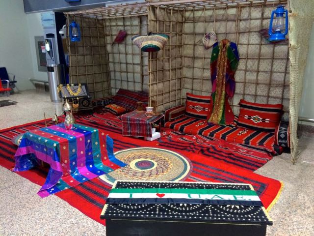 historical monument in a modern airport - in remembrance of travel via camel, not Boeing 