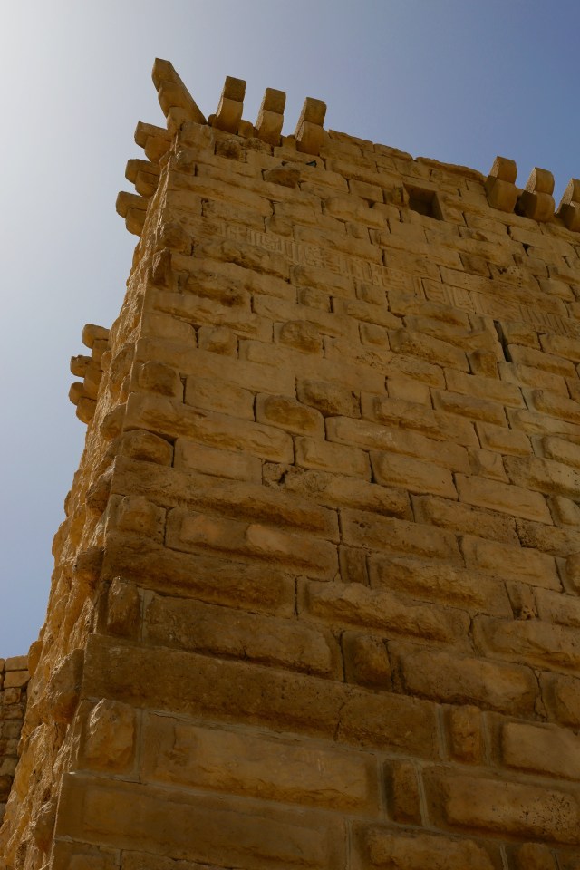 tower with stone inscription