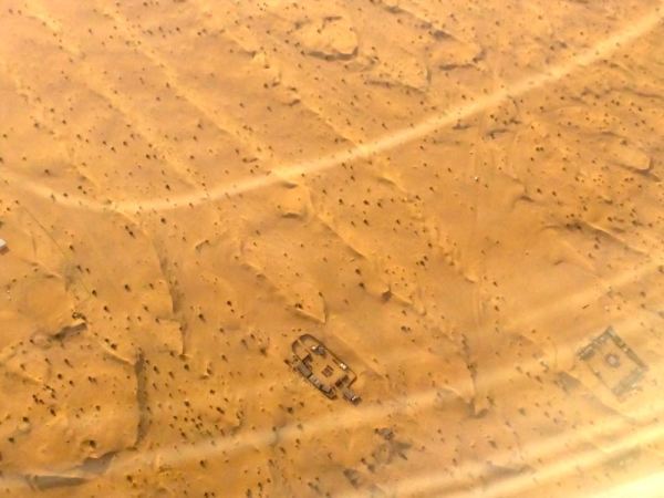 Can you find the road? Tip: there's a car on it